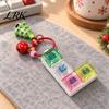 Trendy Bag Charm for Teenagers Christmas Mechanical Keyboard Fidget Keychain, Push Button Stress Relief Desktop Decompression Gadget Toy with Reindeer