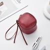 Retro Handheld Coin Purse with Wenge Beads, Flocked Leather Mini Key Holder, and Large Capacity Earphone Pocket Envelope.