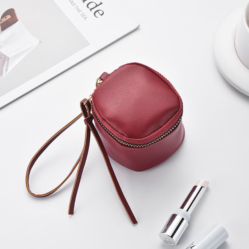 Retro Handheld Coin Purse with Wenge Beads, Flocked Leather Mini Key Holder, and Large Capacity Earphone Pocket Envelope.