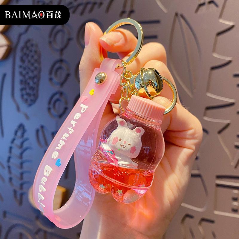 Cartoon oil floating liquid quicksand bottle pearl milk tea bear key chain cute trendy car key chain pendant Key Ring