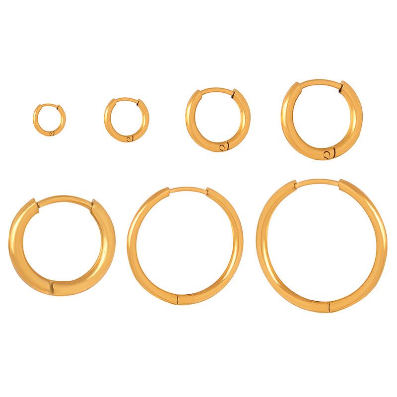 Stylowe geometryczne kolczyki koła z pozłacanego tytanu