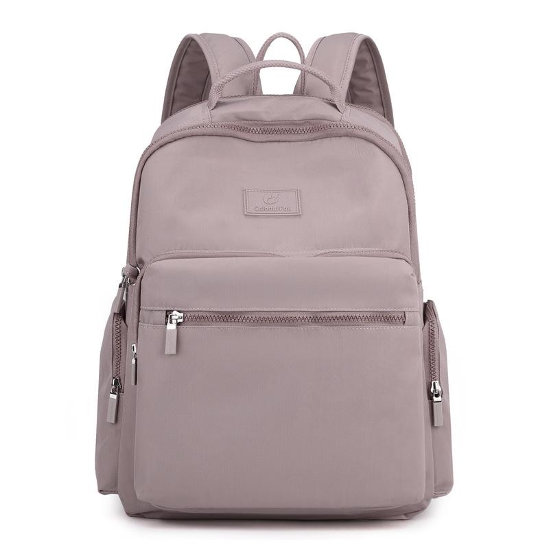 Backpack Travel Casual Fashion Backpack Men and Women Large Capacity Anti-splashing Nylon Backpack