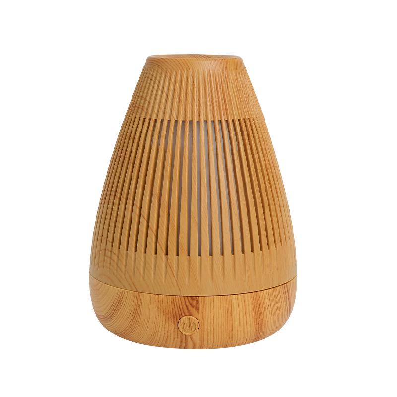 

Compact Retro Wood Grain Aroma Diffuser: Quiet Mist Humidifier for Home, Bedroom, Office, or Hotel 11.7*15.5cm