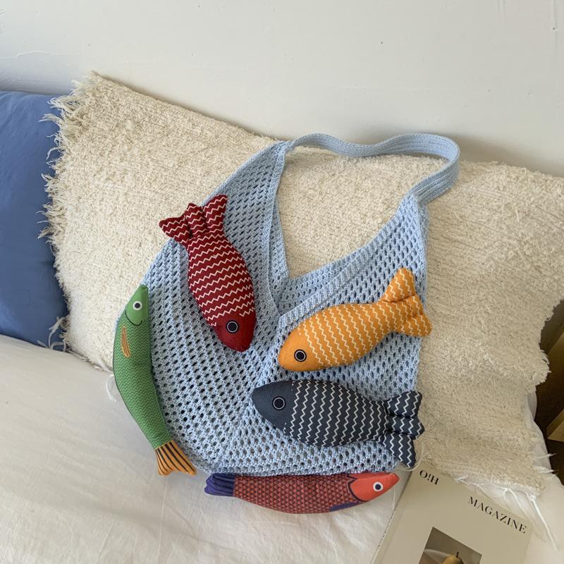 Niche bag women's large-capacity new summer leisure shoulder knitted woven bag commuter tote bag