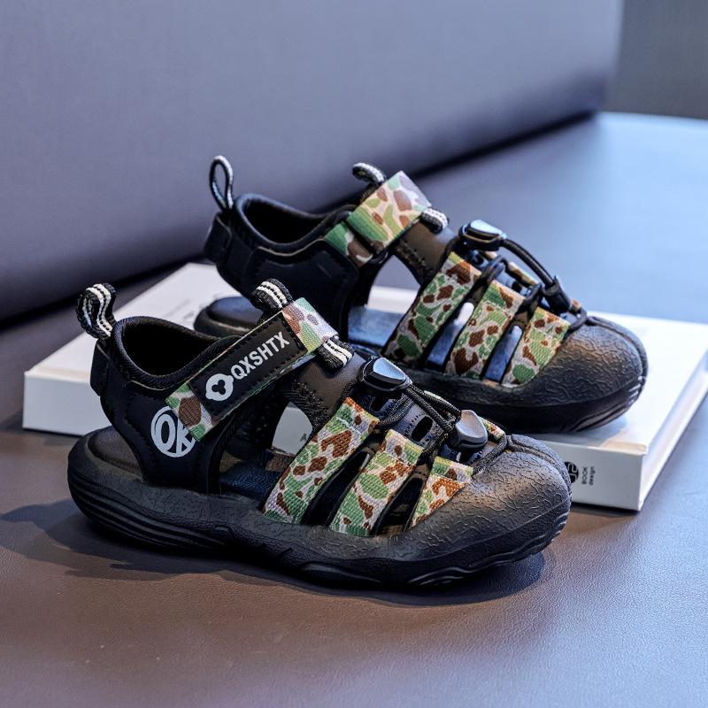Children's sandals 2025 summer new soft-soled boys' beach shoes girls' hollow bag head sandals medium and older children's shoes