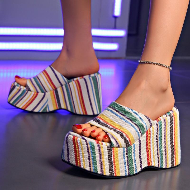 Thick-bottomed slope heel one-word slippers women's high-heeled sponge cake solid color cloth surface beach cool slippers