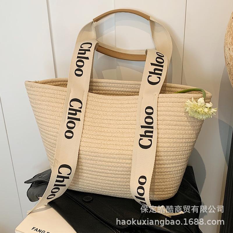 Woven Straw Bag Women's Large Capacity 2025 New Versatile Seaside Shoulder Bag Beach Vacation Commuter Tote Bag