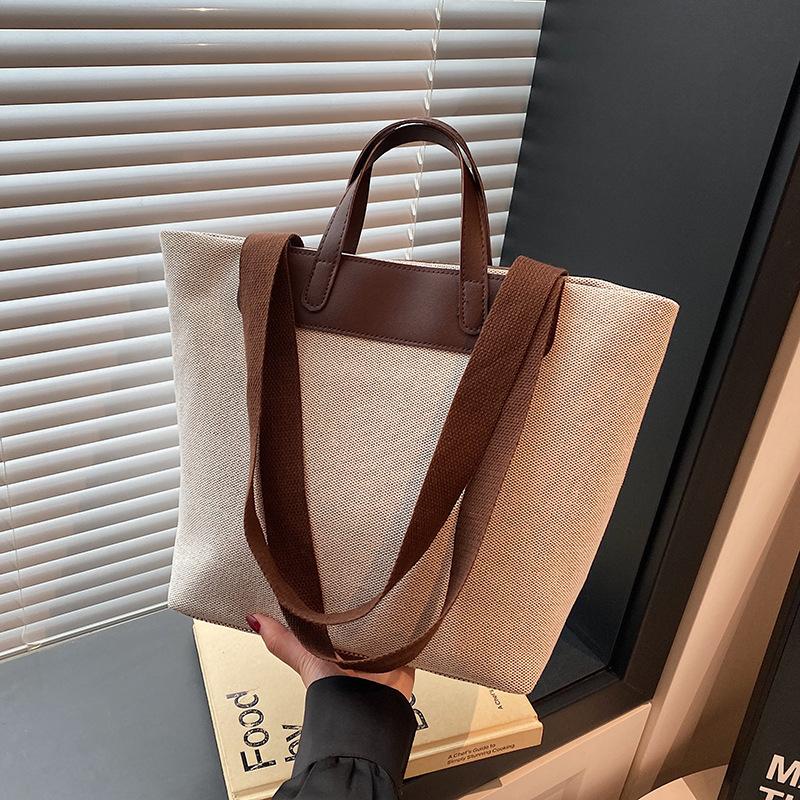 Wholesale Japanese minimalist style portable tote bag women's bag 2025 summer new contrasting color shoulder bag large capacity underarm bag
