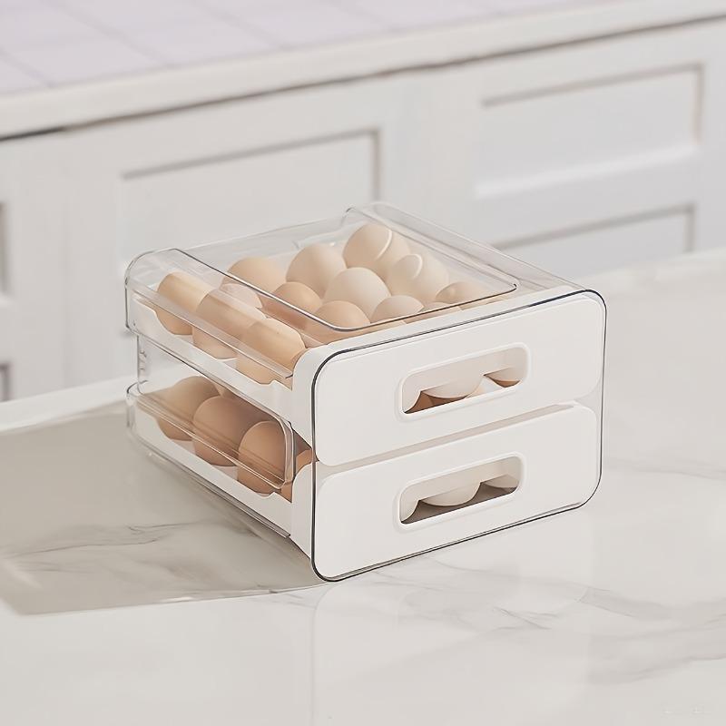 Doppellagige Eieraufbewahrungsbox im Schubladendesign mit 32 Fächern, hergestellt aus PET und PP. Platzsparender Kühlschrankorganizer hält Eier frisch und ordentlich sortiert.
