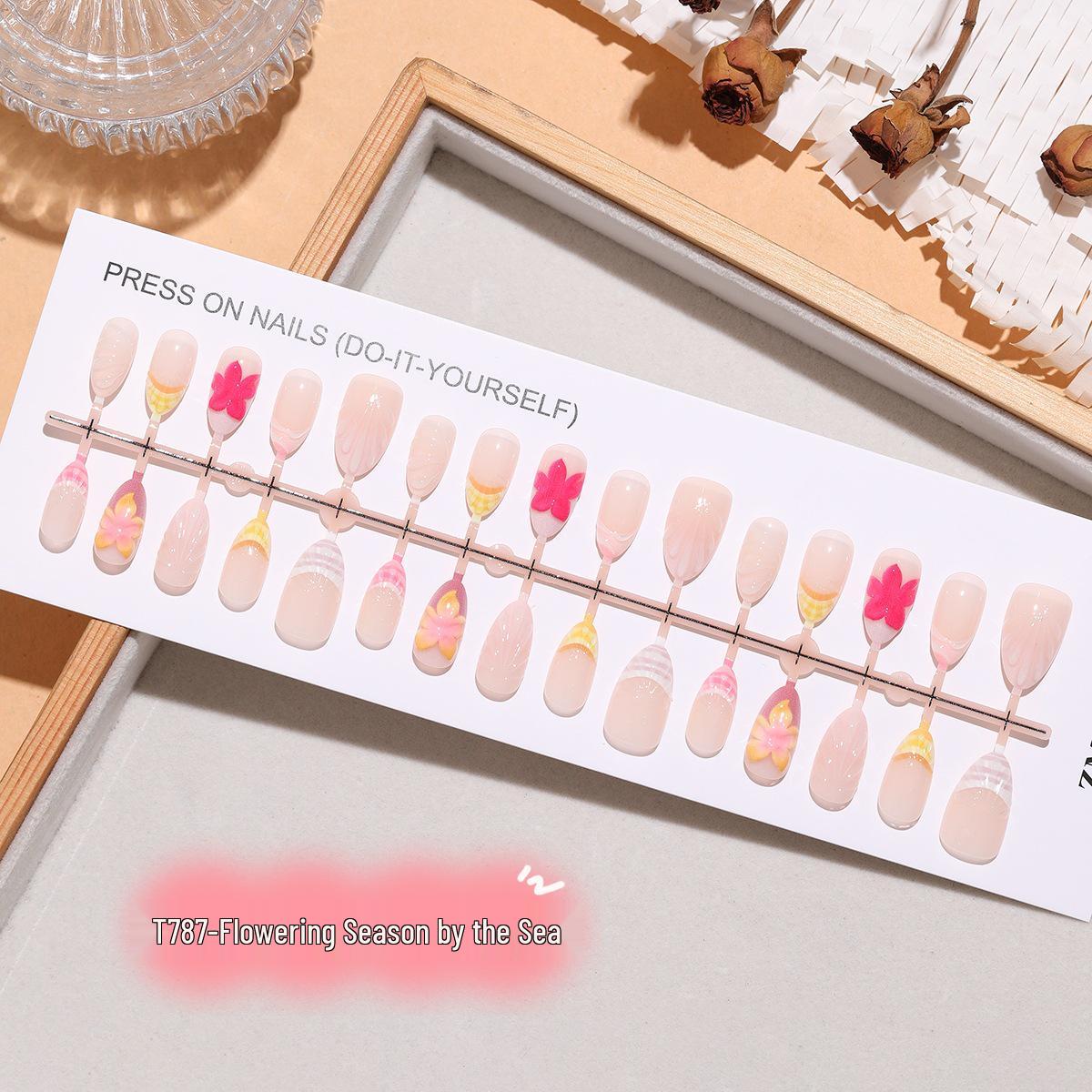 Seaside Almond Short Blooming Nails: European & American Style, Nude Pink Gradient with 3D Floral Shell Texture.