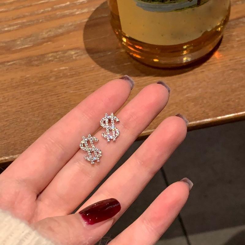 Exquisite Euro-Style Rhinestone Dollar Sign Stud Earrings – Versatile, Luxurious Jewelry for Women.