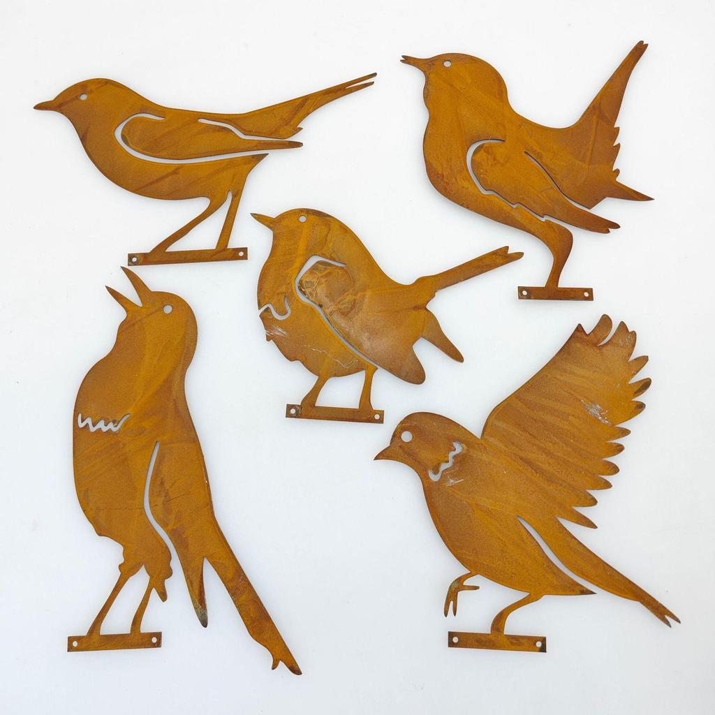 Rusty Metal Bird Silhouette: Distressed Outdoor Garden Ornament