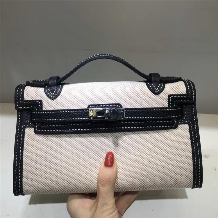 Nowej generacji płócienna torebka kopertówka ze skóry krowiej damska torba na ramię ukośny mała torba torba startowa