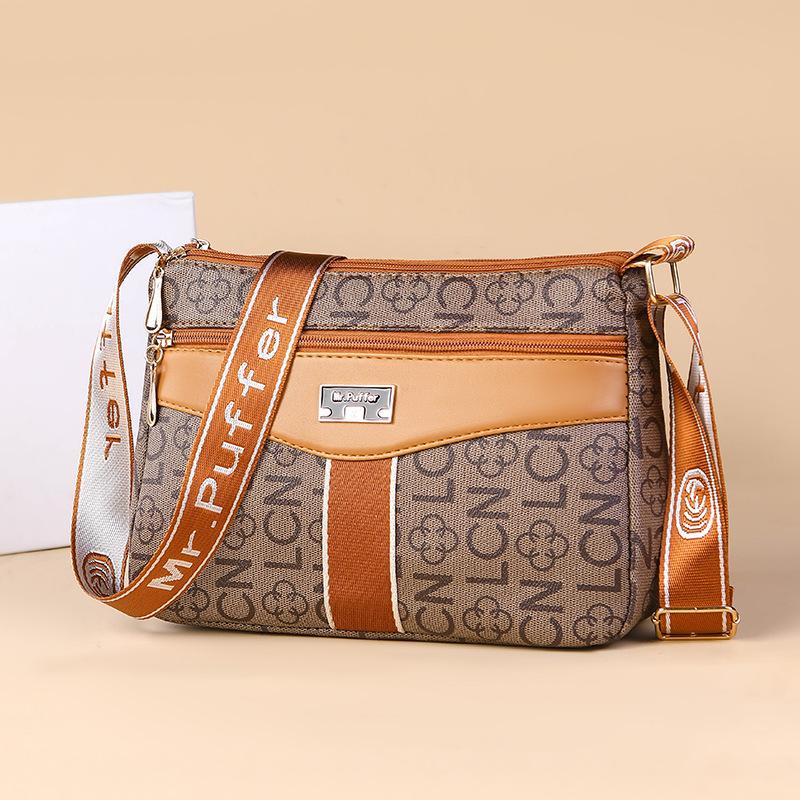 Middle-aged and Elderly Mother Buying A Large-capacity Multi-functional Shoulder Crossbody Bag In Spring