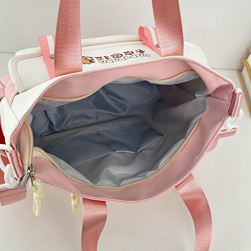 School bag 2025 new large-capacity cartoon multi-compartment high-value school bag Korean version commuting simple make-up bag lightweight backpack
