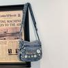 Borsa a tracolla in denim con ricamo di margherite Borsa a spalla da donna
