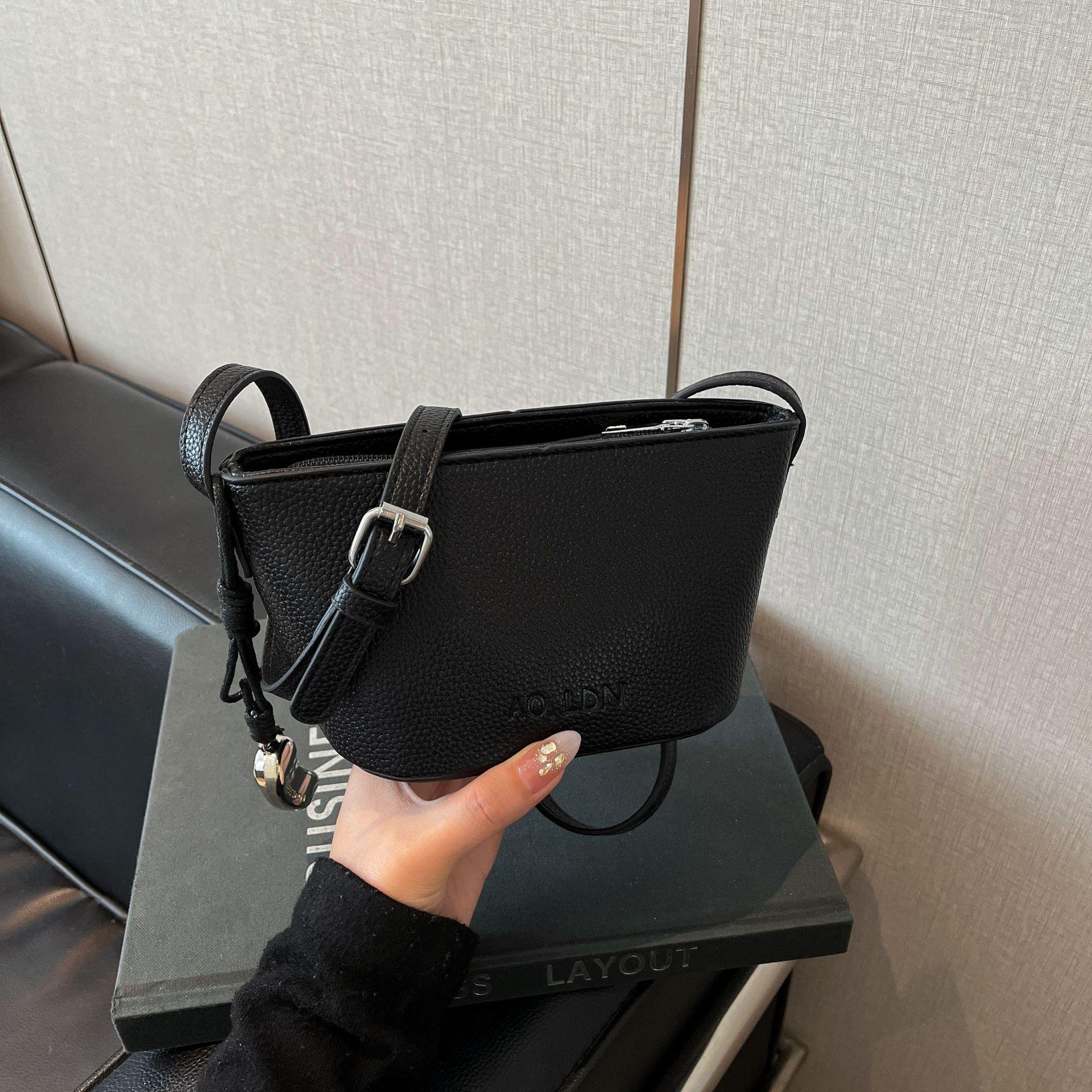 

New fashionable lychee pattern shoulder bucket bag simple and versatile popular messenger shoulder bag чорний