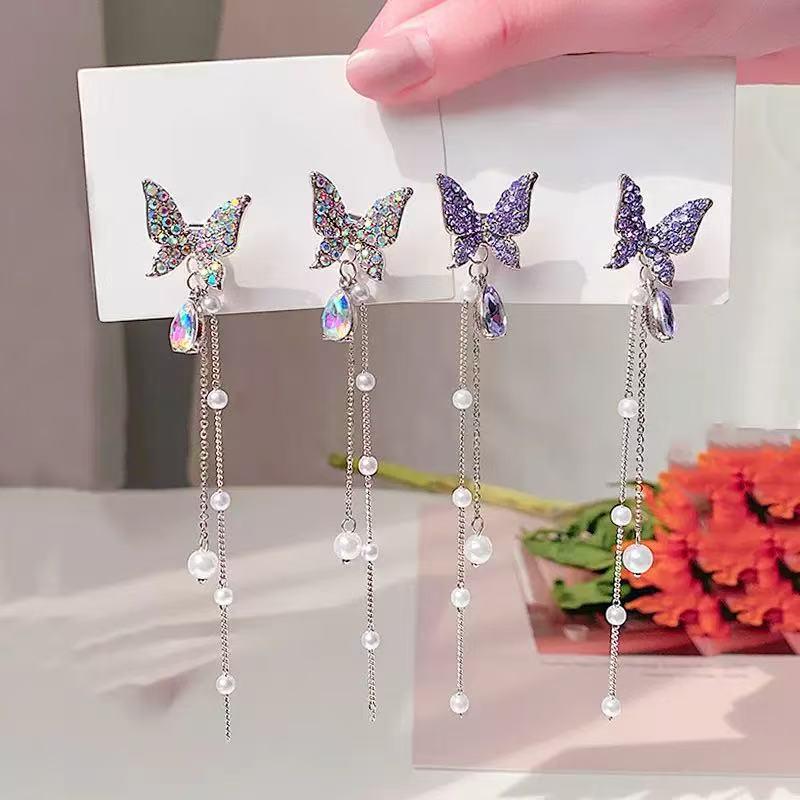 Cercei eleganți cu ciucuri și fluture mov - Stil lung de înaltă calitate pentru un aspect subțire