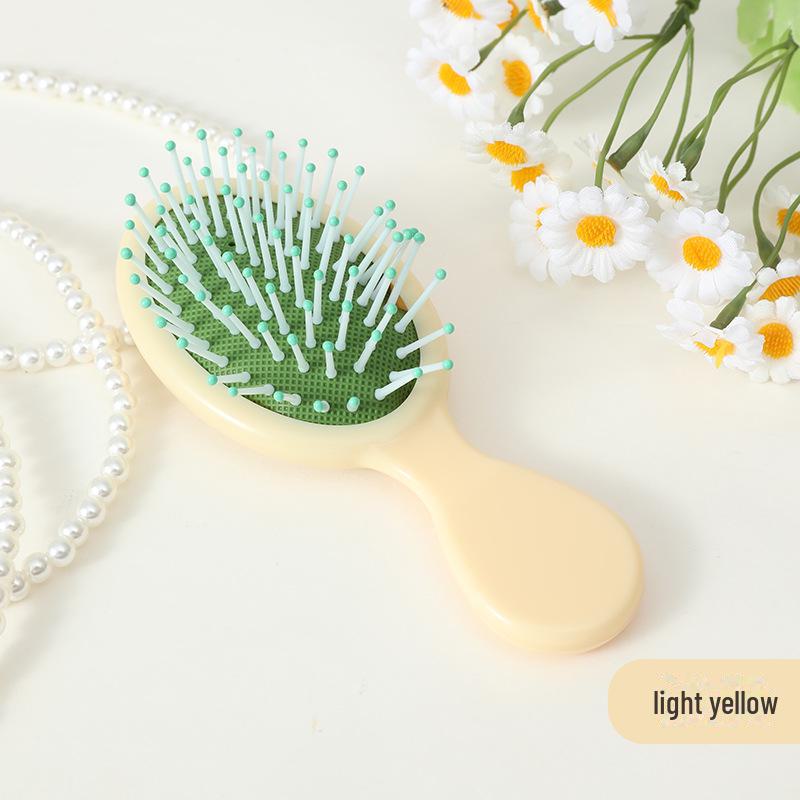 

Міні гребінець для масажу волосся з повітряною подушкою цукеркового кольору для дітей світло-жовтого кольору