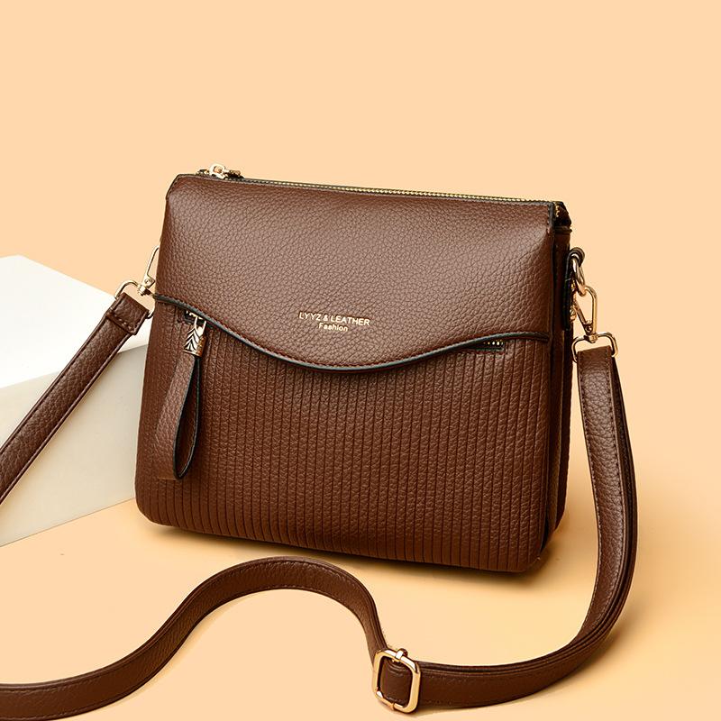 Eine Nischendesign Kleine Quadratische Tasche, Eine Modische Einzel-Schultertasche für Mütter mittleren Alters, und Eine Lässige Umhängetasche