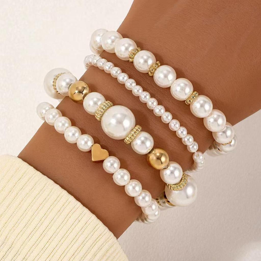 Set di 4 Braccialetti con Perle a Forma di Cuore e Perline per Donna