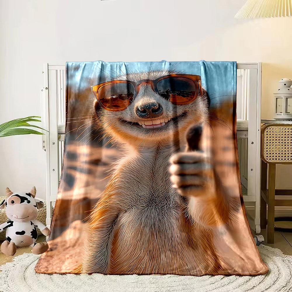 

A cheerful meerkat wearing sunglasses gives a thumbs-up in sunny scenery. for all seasons blanket lunch break throw gift 80cm x 120cm