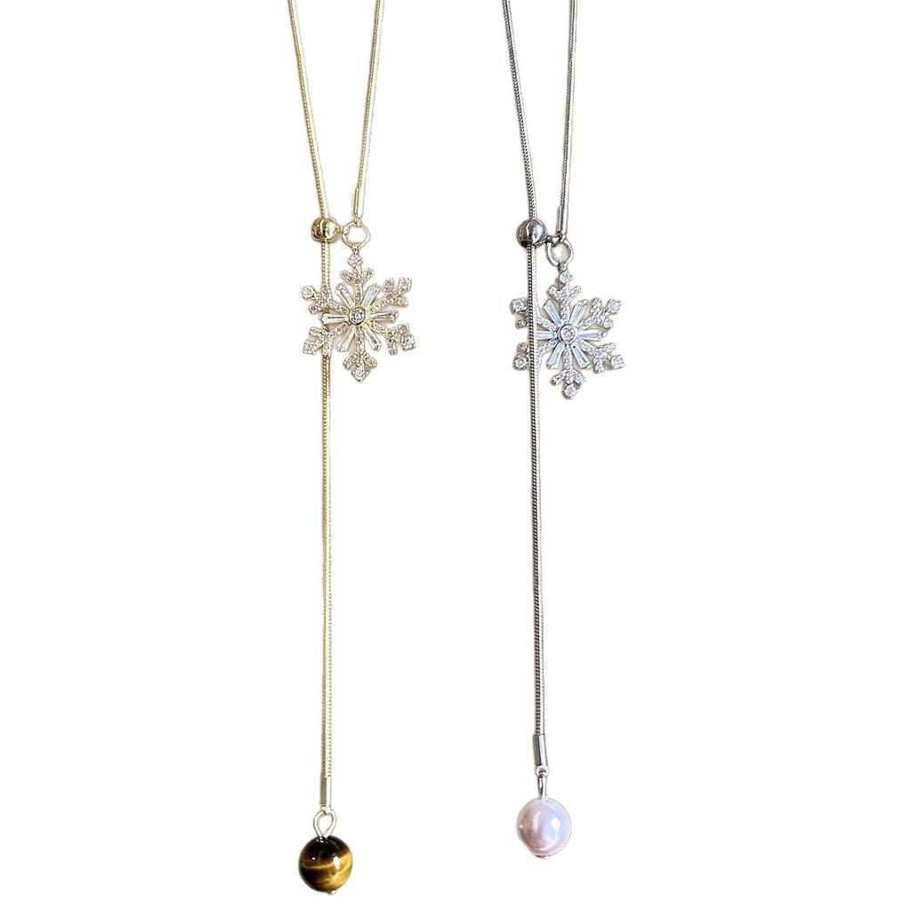 Zircon snowflake pendant can pull necklace women's autumn and winter sweater chain light luxury high-end temperament neck chain accessories