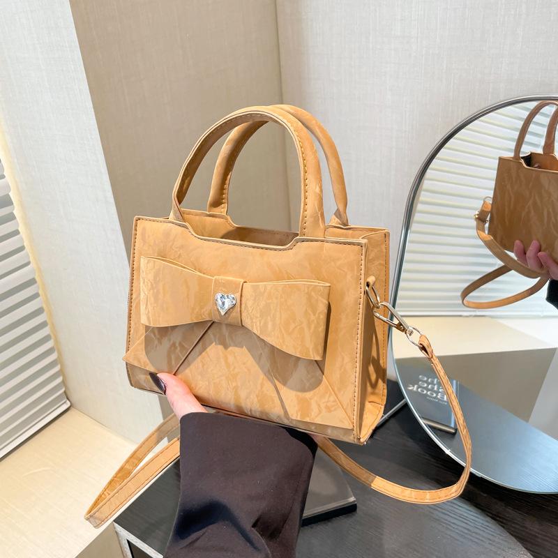 

Niche bow bag 2025 new cute small square bag fashionable versatile shoulder bag commuter messenger bag коричневый