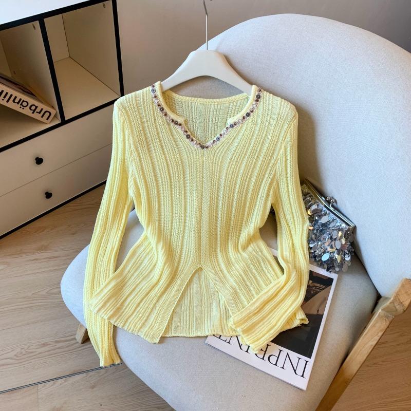 V-neck design sense long-sleeved knitted sweater women's early autumn new slim-fit split top