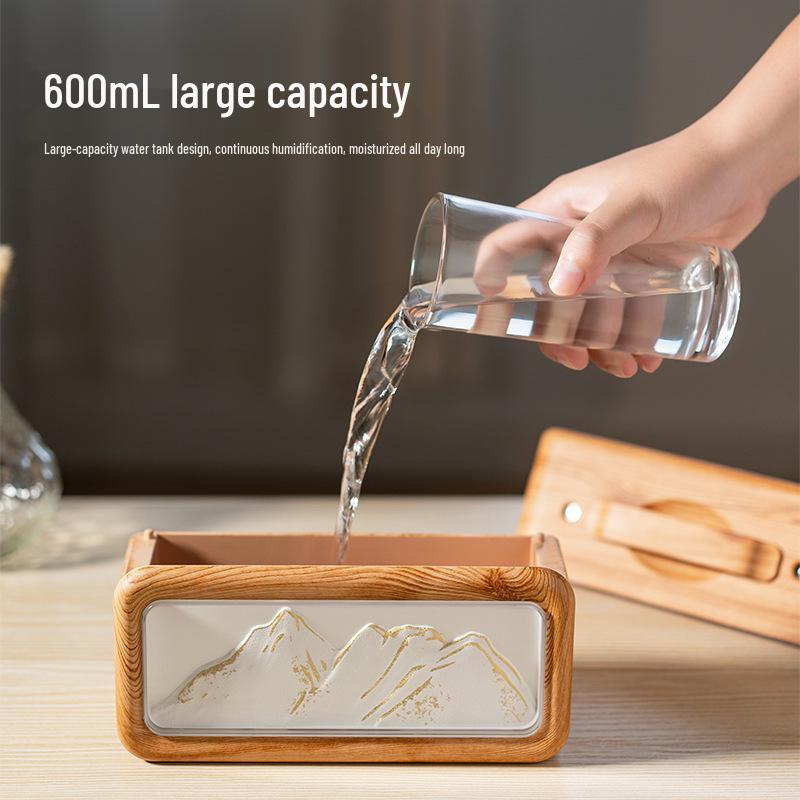 Creative USB Snow Mountain Humidifier: Dual Spray, Large Mist Output, with Ambient Light for Home or Bedroom