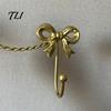 Metal Three Link Hook Iron Art Bow Triple Hook, Wall Mounted Decorative Hanger, French Gold Towel Rack Style Organizer for Entryway Bathroom