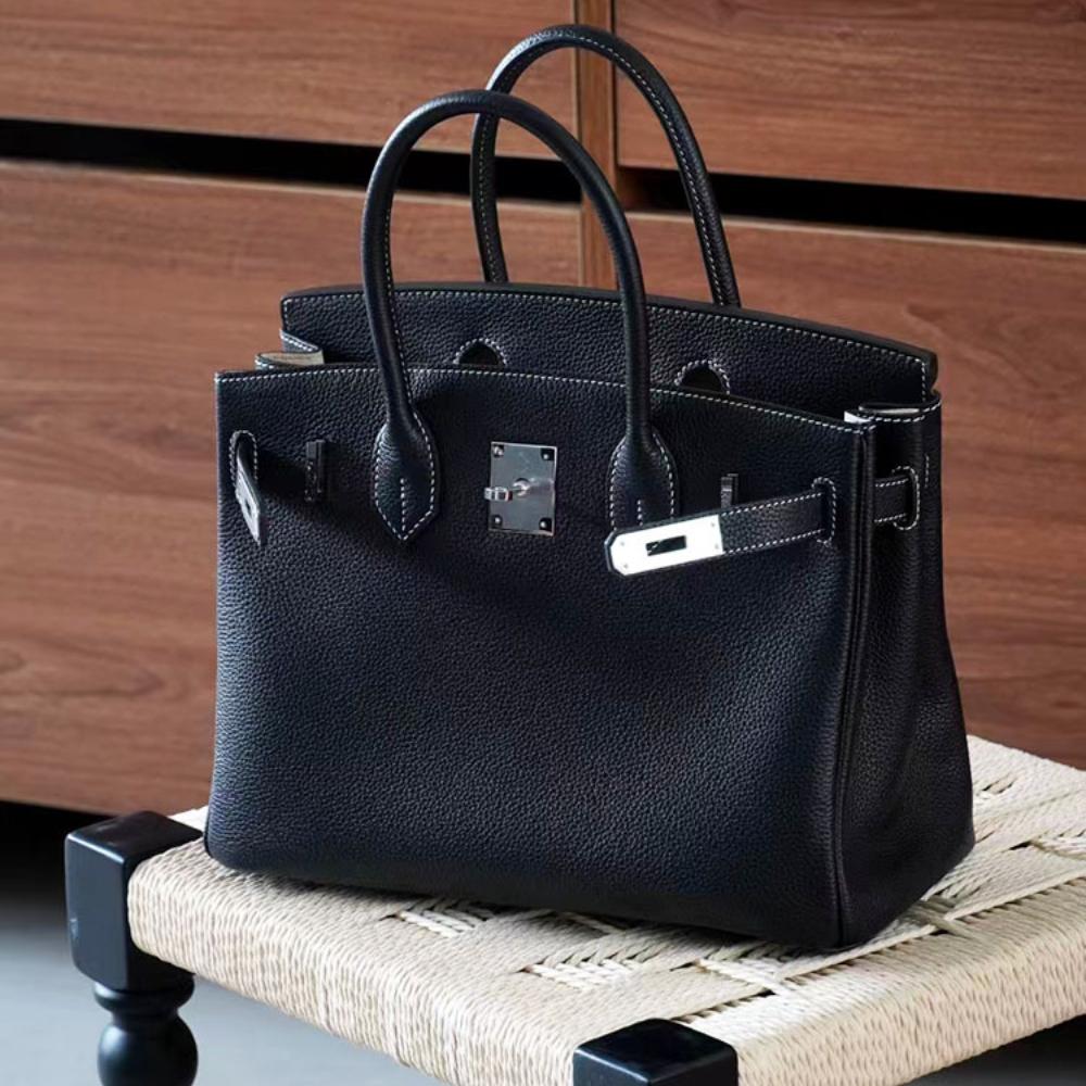 Høykvalitets spesiallaget semi-vokset tråd semi-håndsøm stålbeslag importert togo toppnarvet kuskinn håndveske med en følelse av luksus