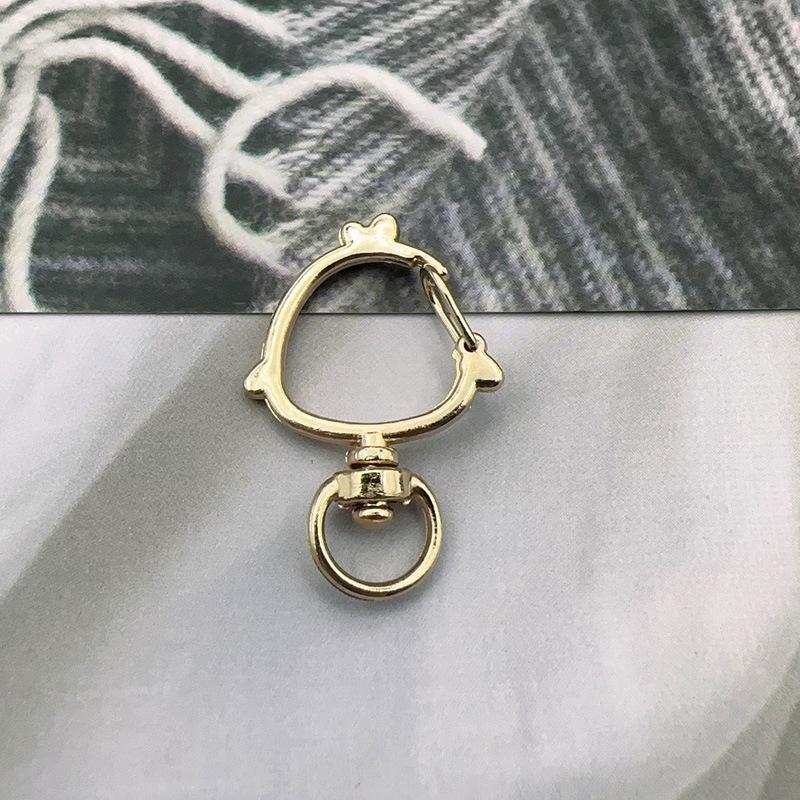 Handmade Metal Rotating Chick Keychain with Christmas Bell and Color Retention.