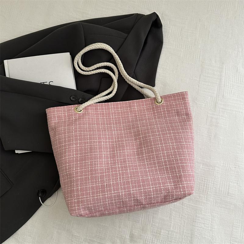 Plaid woven tote bag women's 2025 new high-value commuter art students class handheld cloth bag tide