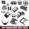 LHD For Toyota BZ4X EA10 2024 Carbon Fiber Interior Handle Window Switch Cover Gear Water Cup Holder AC Outlet Frame