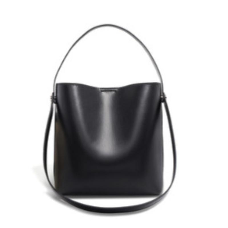 

Leather women s bags New trendy fashion casual niche tote bags Large capacity shoulder cowhide commuter bucket bags чорний