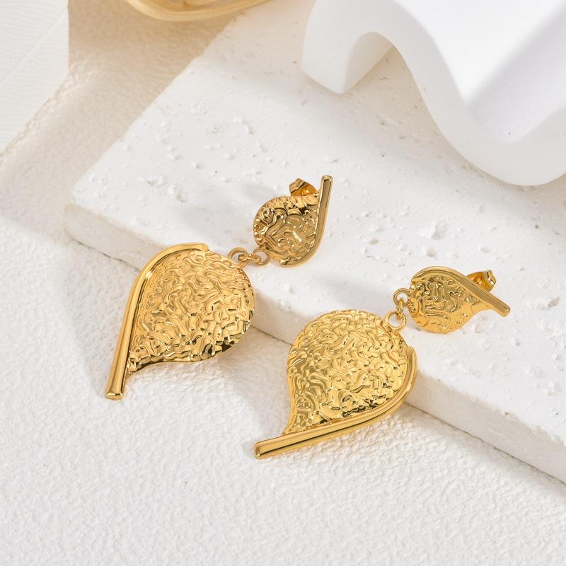 Модные серьги-подвески для женщин