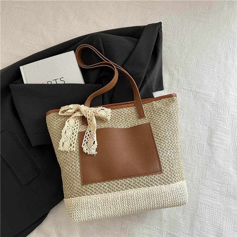 

Woven straw bag women s large-capacity new summer versatile hollow tote bag seaside vacation beach bag