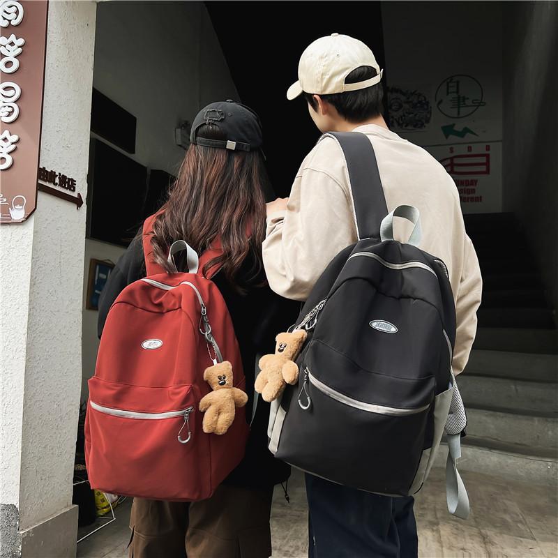 College style labeled student schoolbag spring new large-capacity junior high school student college backpack