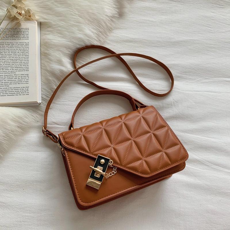 

Missing corner personalized lock shoulder bag women s 2025 autumn and winter new women s bag rhombus embroidered thread portable messenger bag коричневый