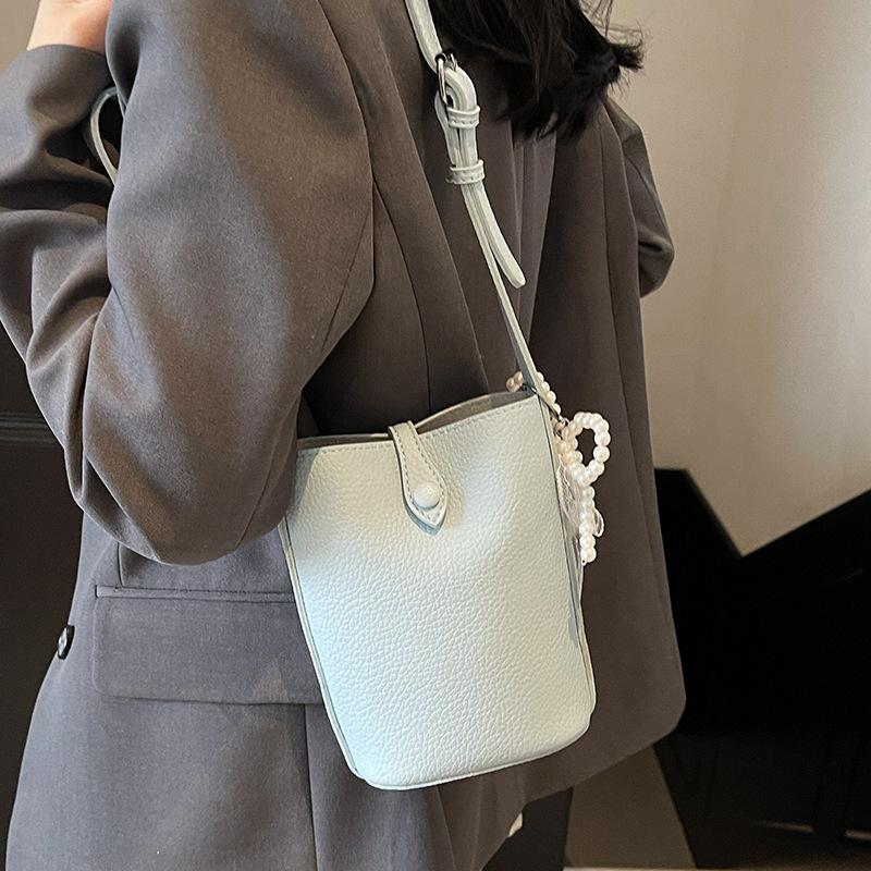 Koreańska wersja casualowej torby na telefon komórkowy w kolorach makaronowych z prostym wzorem liczi, damska, wszechstronna, na dojazdy, w stylu zagranicznym, listonoszka, worek