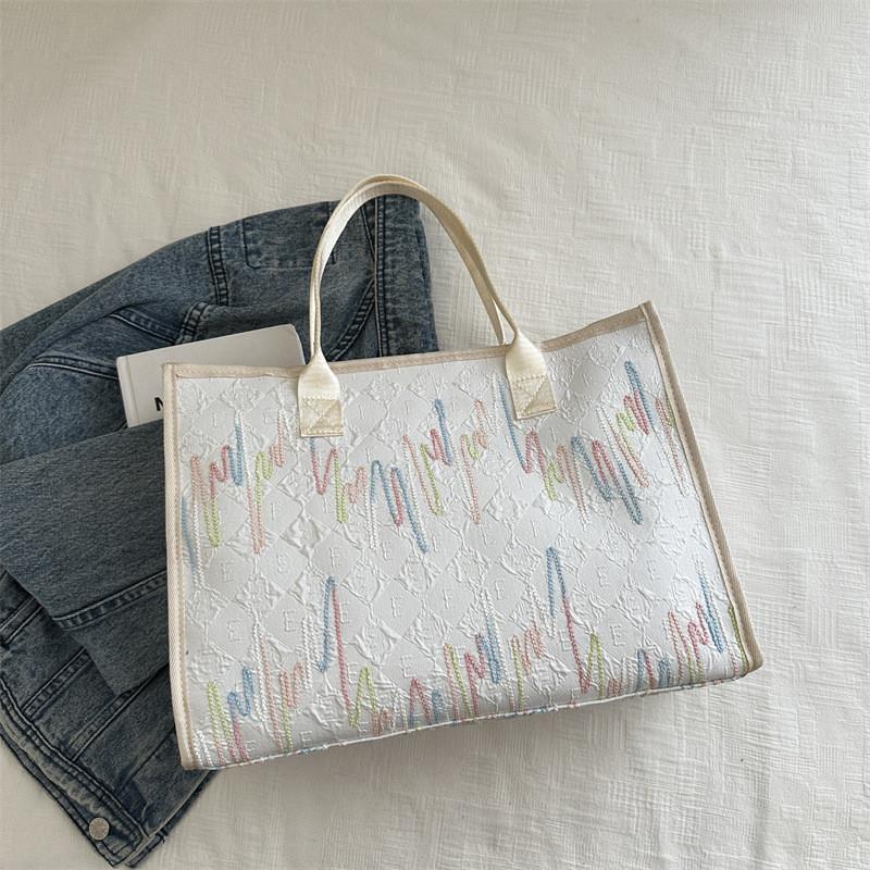 Fashionable Medium Sized Womens Tote Bag With Soft Structure And Interior Pockets