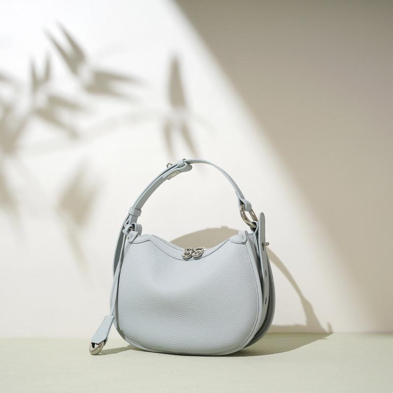 

Handbag bag women s spring and summer new simple shoulder bag high-end niche design messenger bag women s large capacity светло-синий