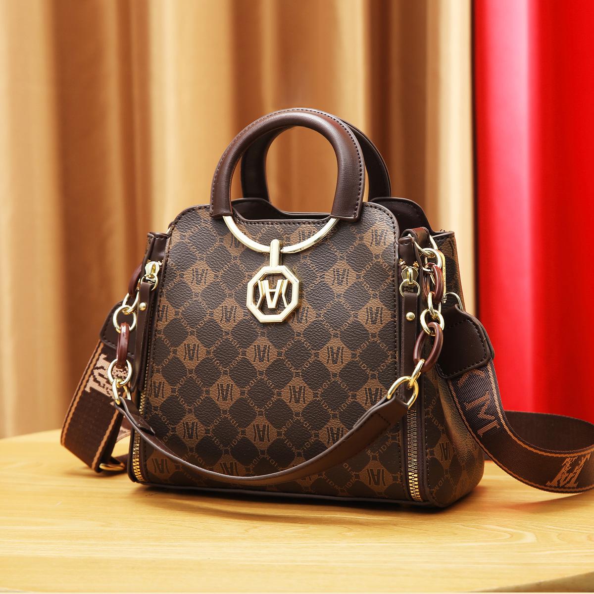 

Хит продаж сумки Сумки-ведра женские 2025 новые большой вместимости высококлассные нишевые универсальные сумки через плечо женские сумки