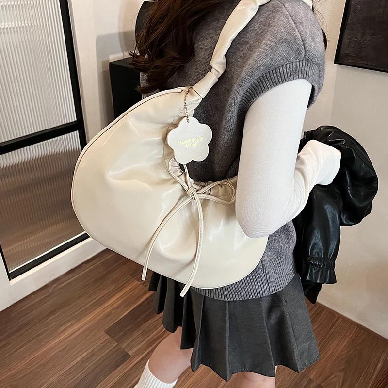 Geantă de umăr geantă elegantă de înaltă calitate textură feminină nouă de toamnă și iarnă geantă crossbody versatilă în formă de semilună