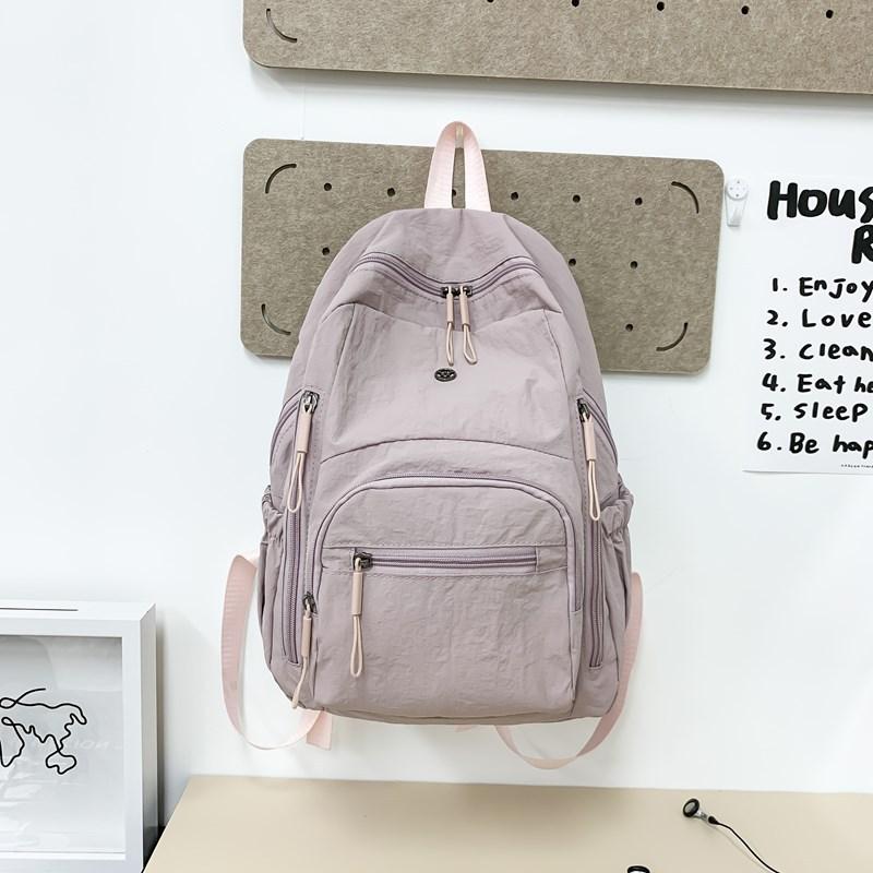 Lightweight schoolbag female solid color water-proof multi-pocket computer commuting backpack college student class travel backpack