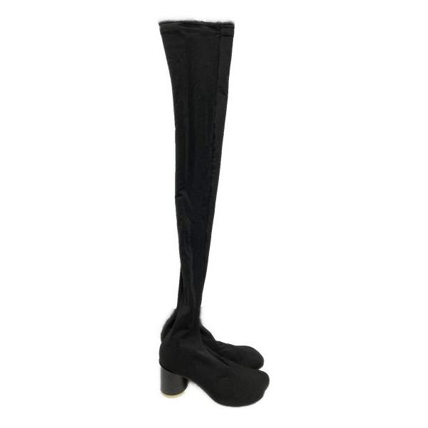Used thigh-high boots