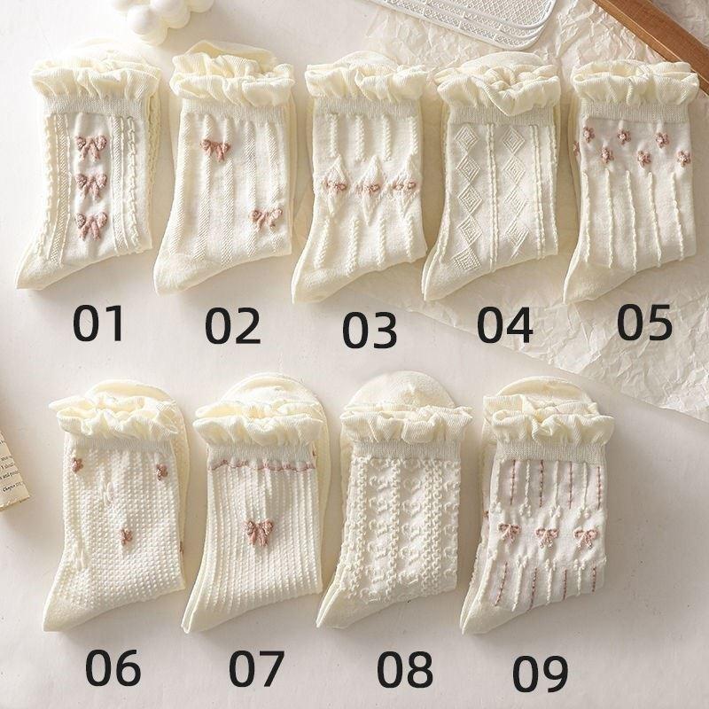 Chaussettes blanches simples, polyvalentes, jolies, nœuds papillon, petites fleurs, chaussettes tube moyennes pour femmes, Kawaii Harajuku Jk Lolita, chaussettes en coton pour filles