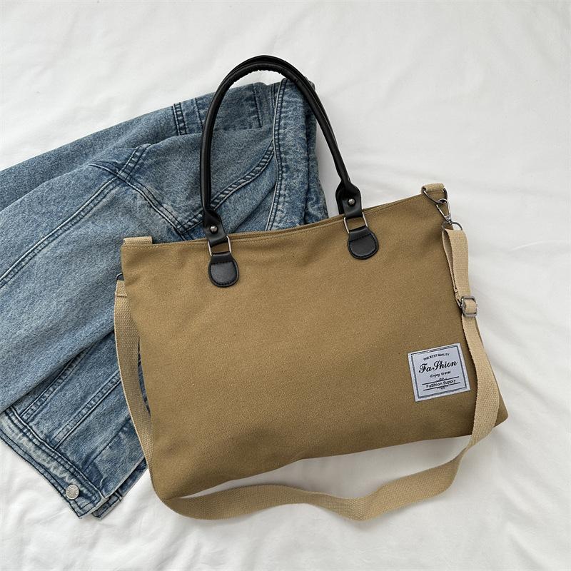 

Простая и модная сумка-тоут для женщин 2025 осень новый модный тренд большая вместительная сумка для поездок на работу повседневная наплечная сумка для женщин хаки