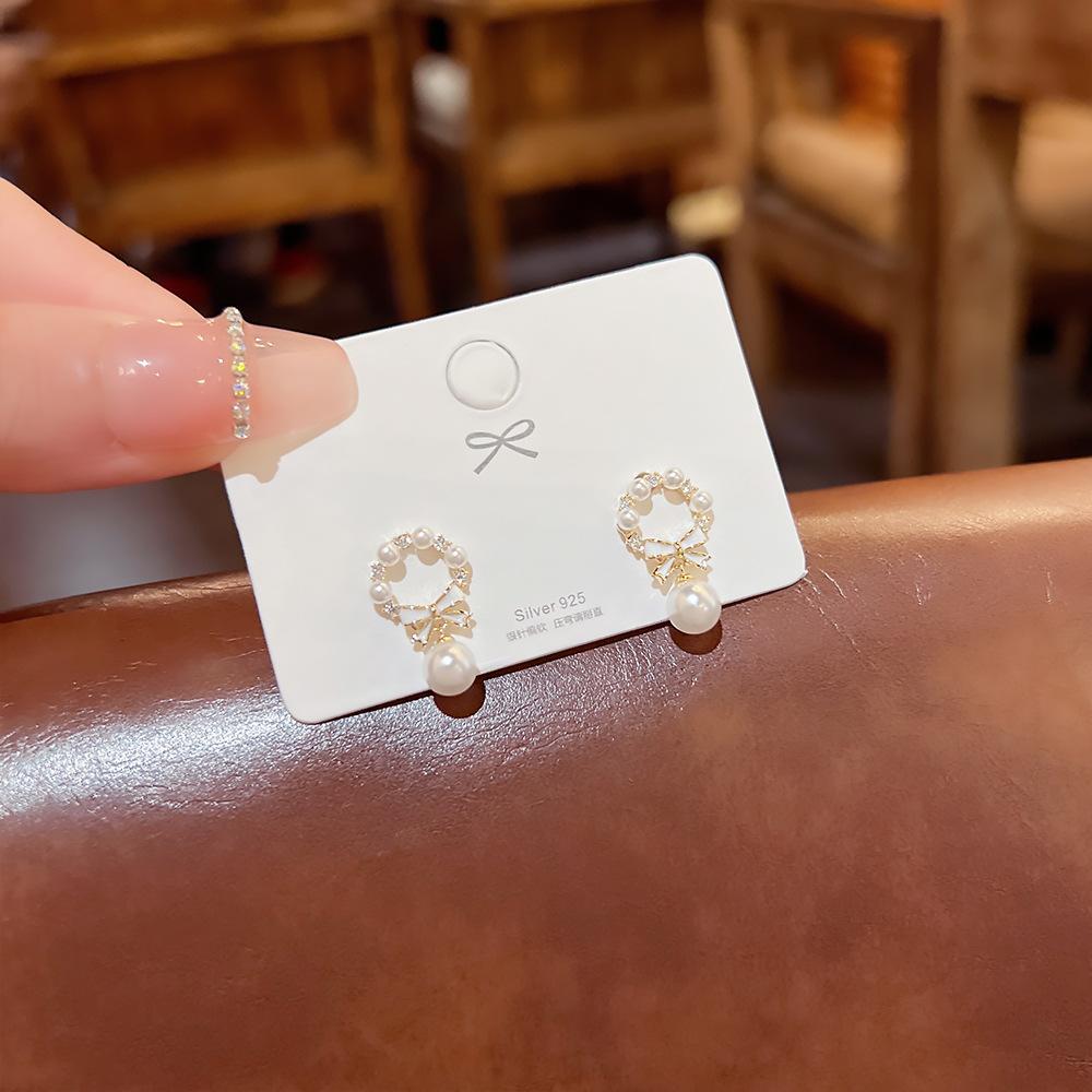 925 Silver Needle Unique Bow Pearl Daily Earrings Female High Sense of Luxury Earrings Niche Design Sense Earrings